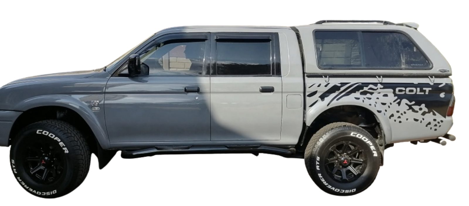 Custom designed cut out stickers as per customers request applied to the sides of the vehicle